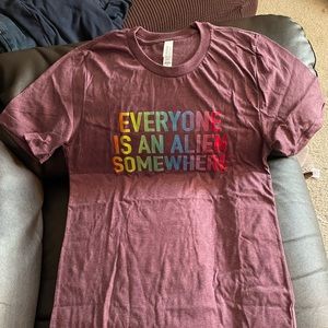 Coldplay tee "Everyone is an alien somewhere"